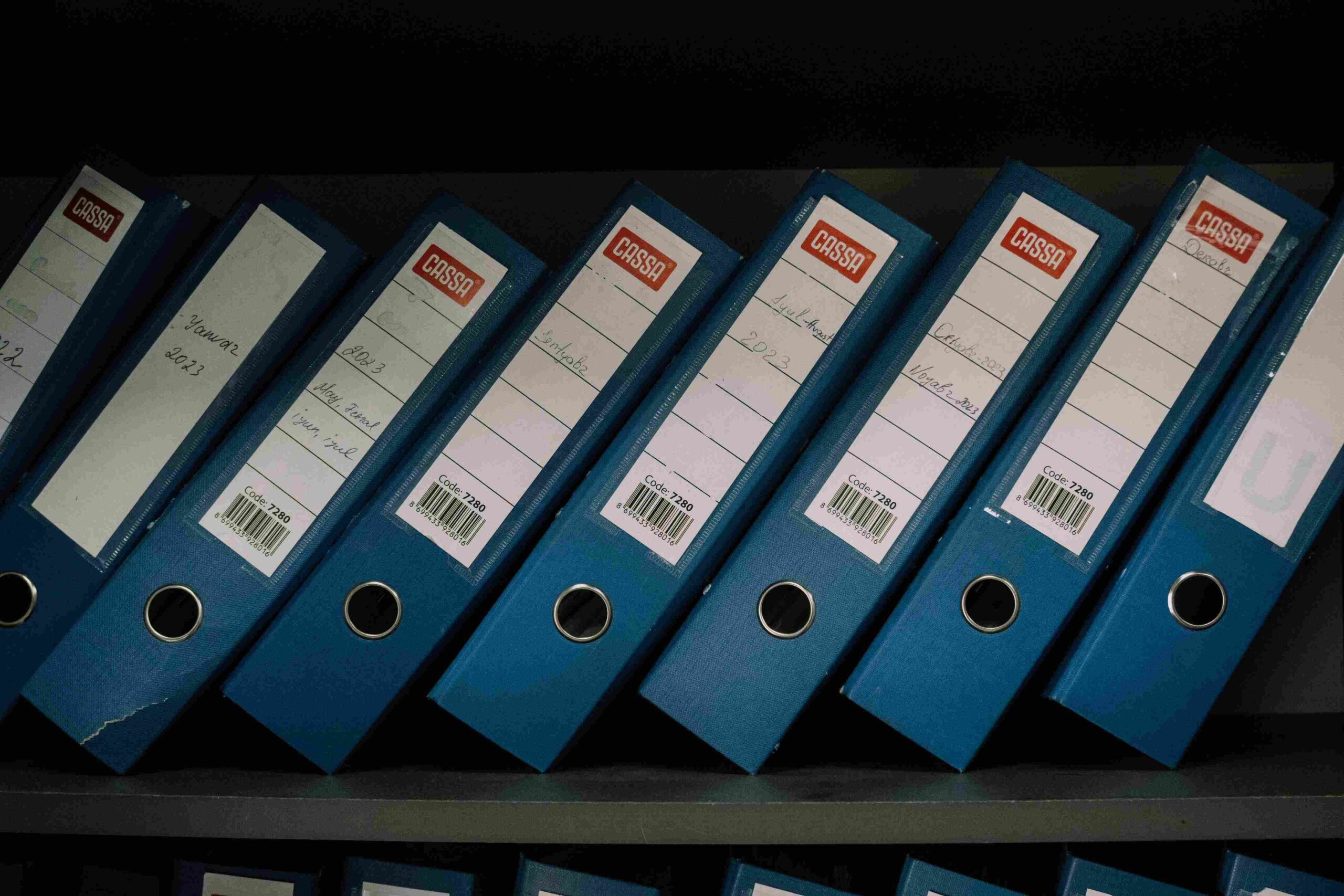 Organized file binders representing client document collection for Australian accounting firms and the need to track missing items